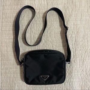 Prada crossbody bag in black.